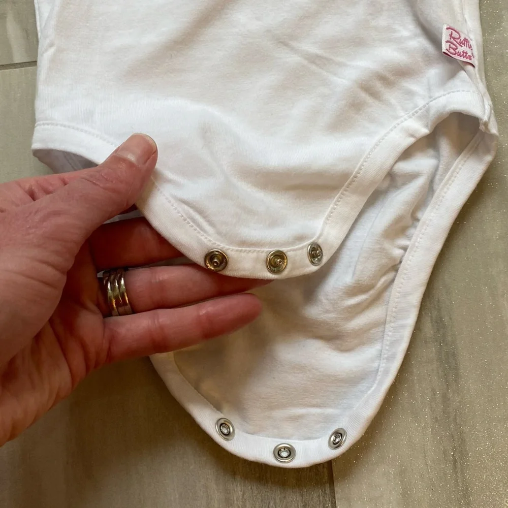 NWT RuffleButts White Long Sleeve Bodysuit with Peter Pan Collar, girls 3-6M